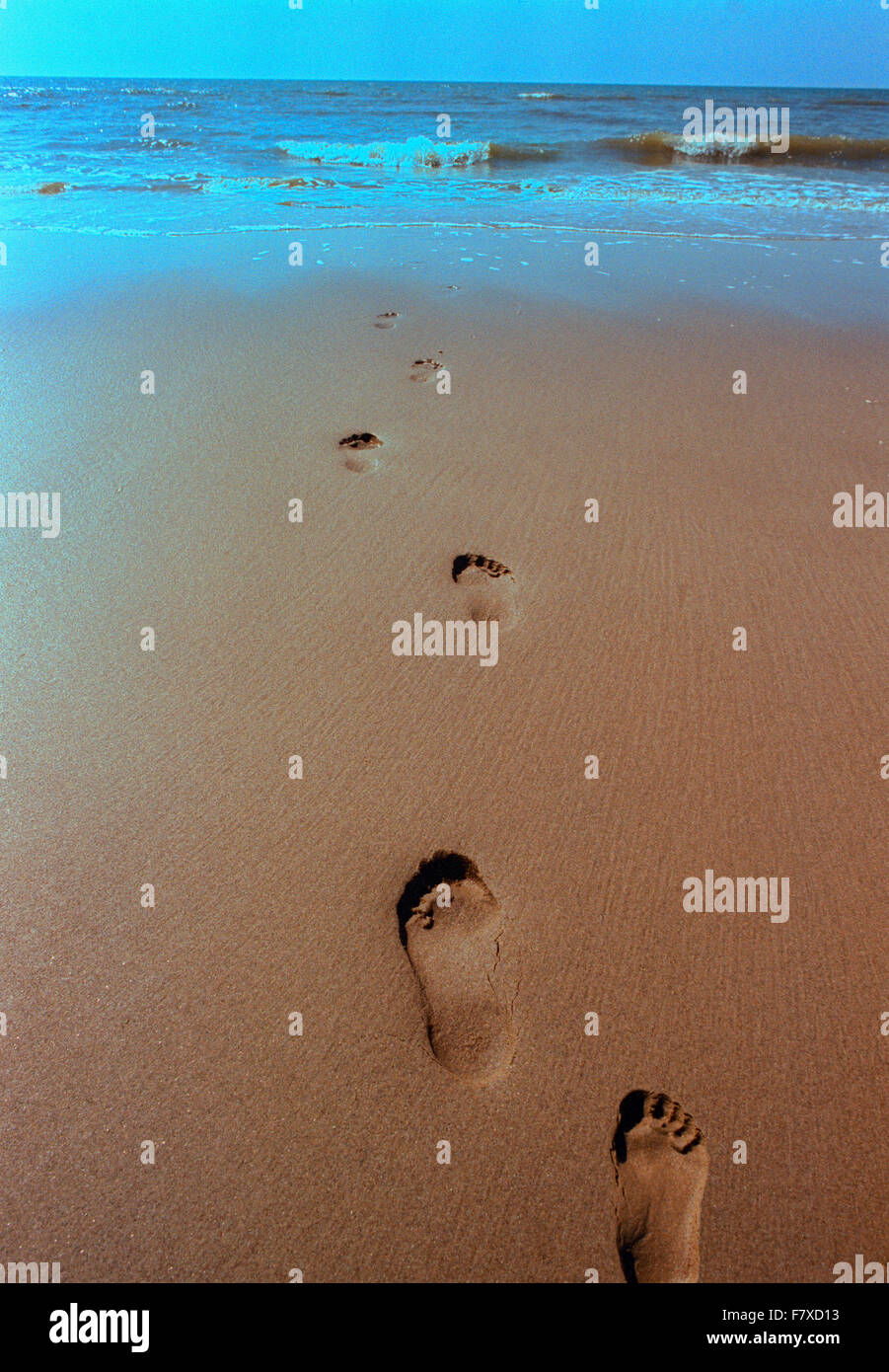 Menschliche Fußspuren im sand Stockfoto