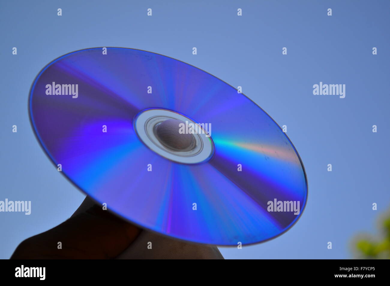 Oberfläche einer DVD CD reflektieren Licht unterschiedlicher Wellenlängen Stockfoto