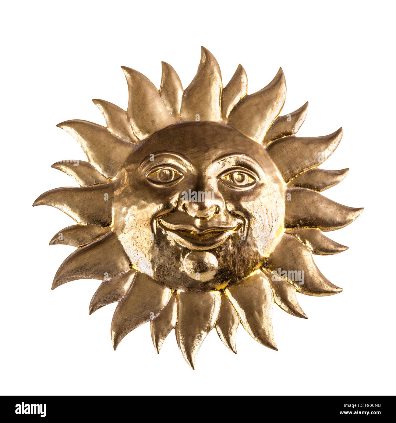 eine goldene Bronze Sonnengesicht isoliert auf einem weißen Hintergrund Stockfoto