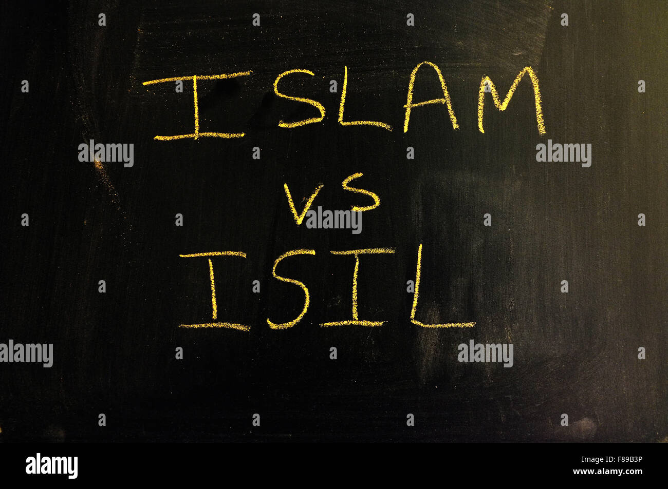 Islam Vs ISIL mit Kreide auf eine Tafel geschrieben. Stockfoto
