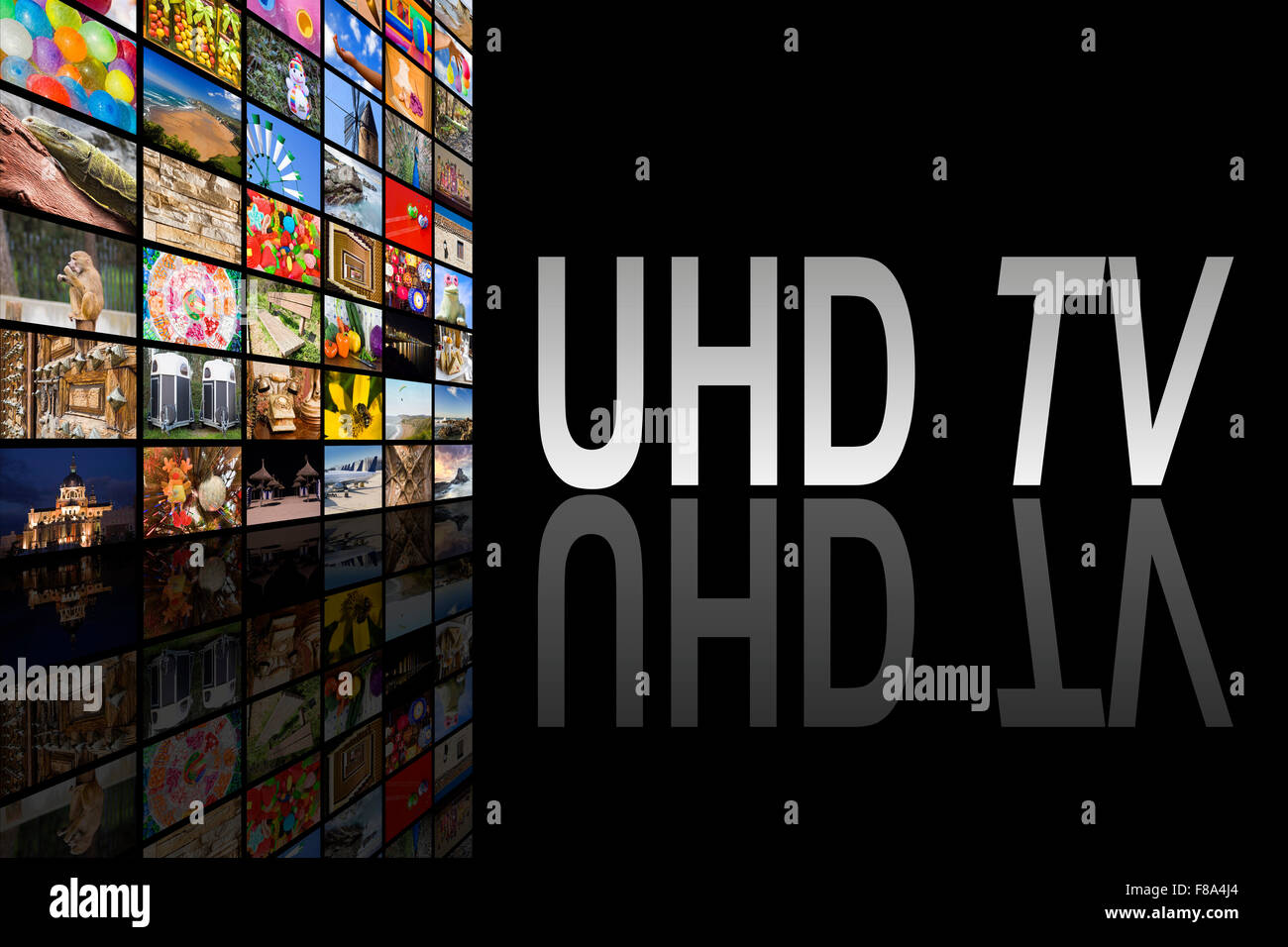 Konzept der Ultra High Definition TV auf schwarzem Hintergrund mit Reflexion Stockfoto