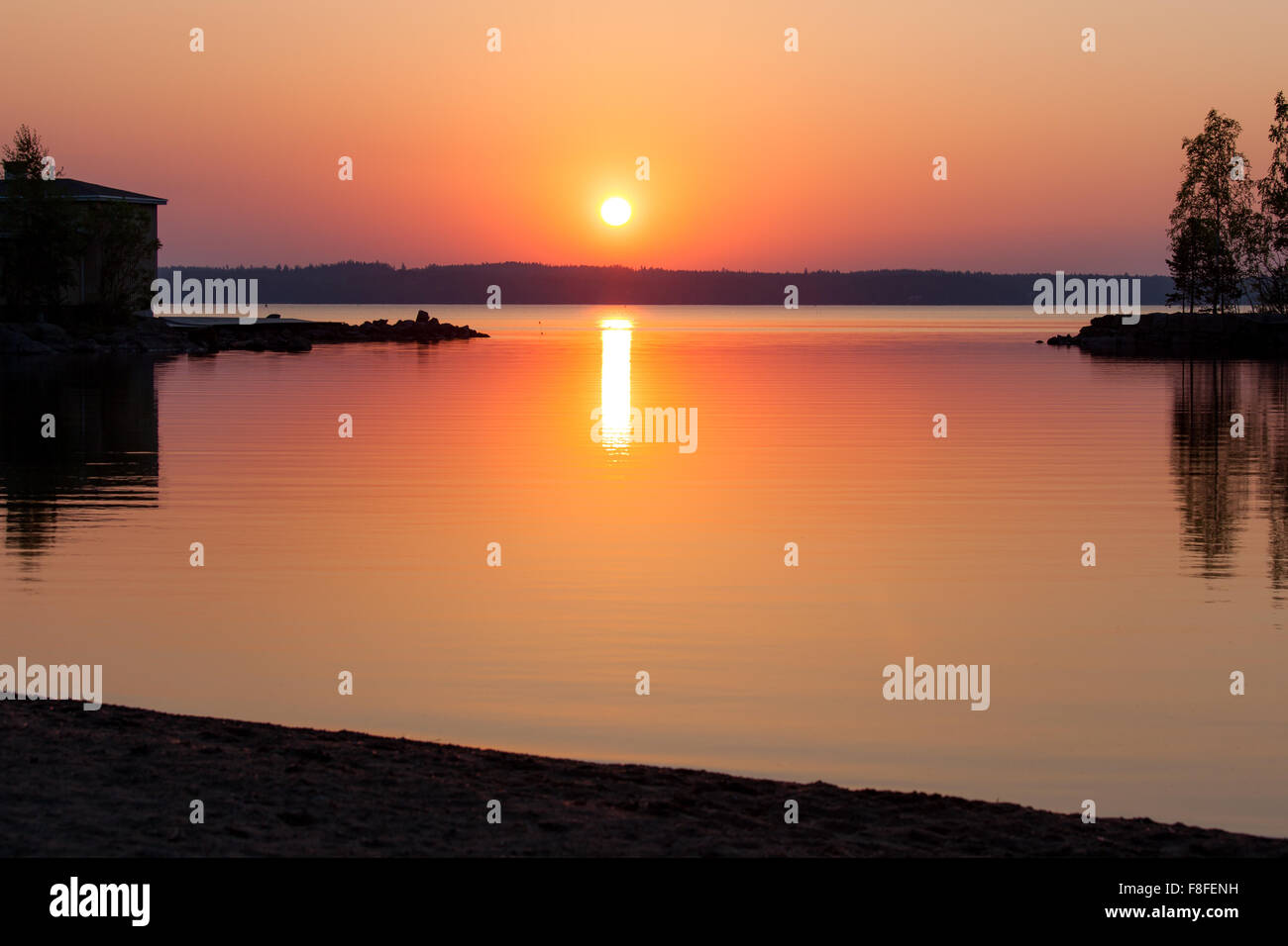 Lebendige Silhouette und Sonnenuntergang Strand Stockfoto