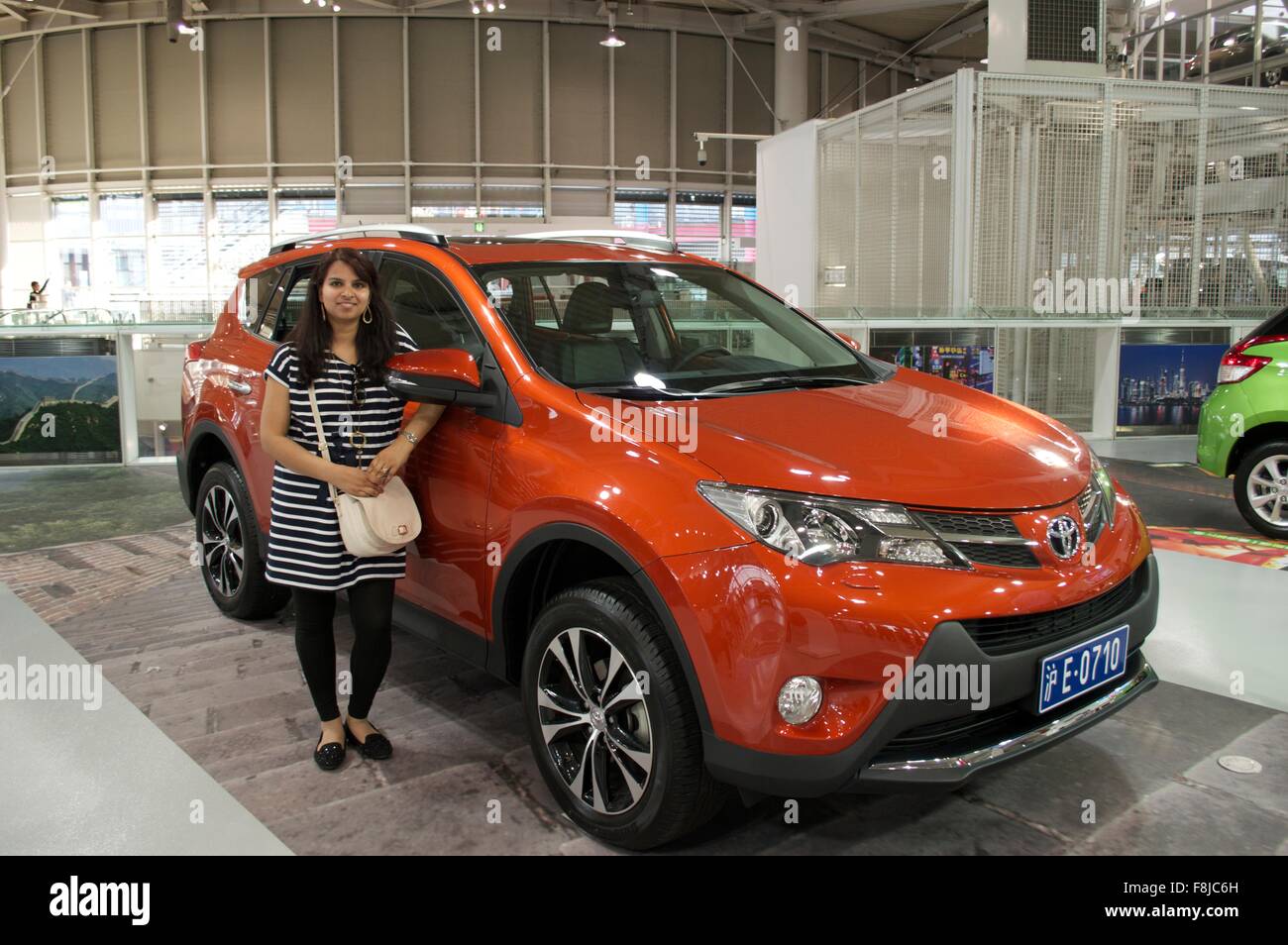 Autos und Frauen Stockfoto