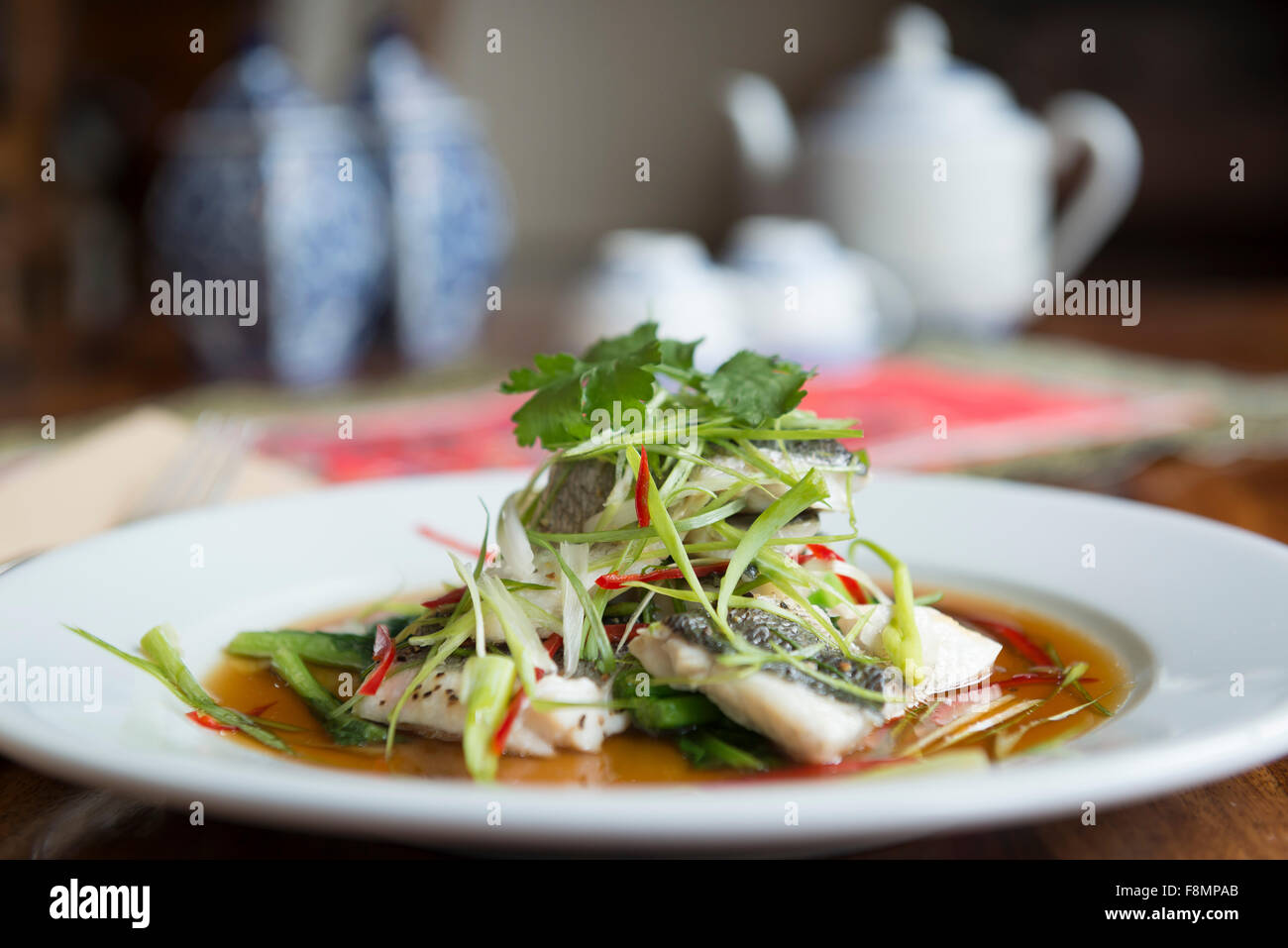 Singapur-Küche in einem Restaurant serviert. Fisch. Stockfoto