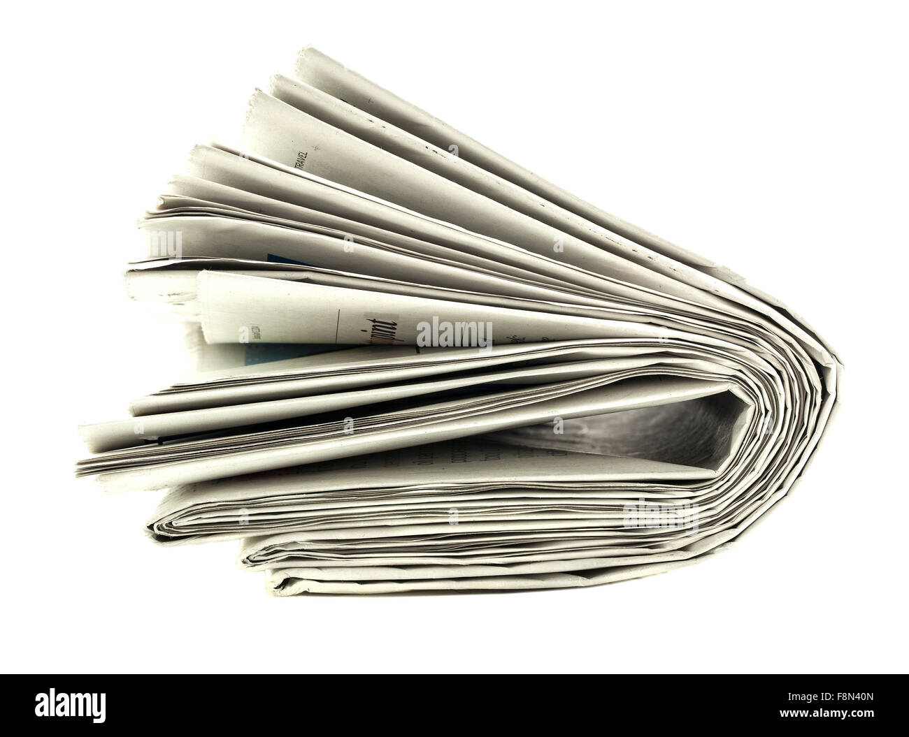 Gefaltete Zeitung auf weißem Hintergrund Stockfoto