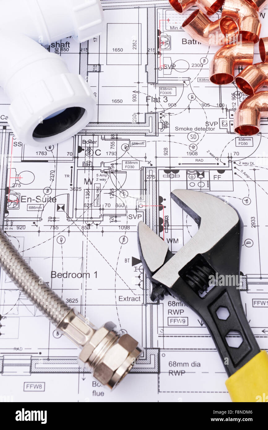 Sanitär-Komponenten auf Haus Pläne Stockfoto
