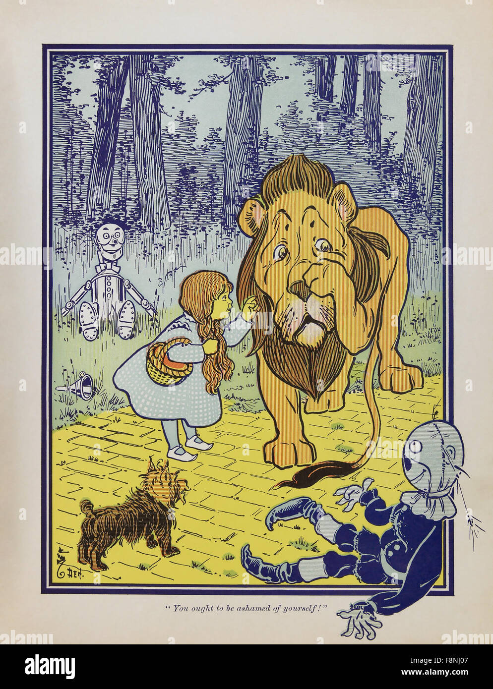 DER wunderbare Zauberer von OZ Dorothy trifft den feigen Löwen gezogen für die erste Ausgabe im Jahr 1900 das Buch von Frank Baum von William Denslow. Stockfoto