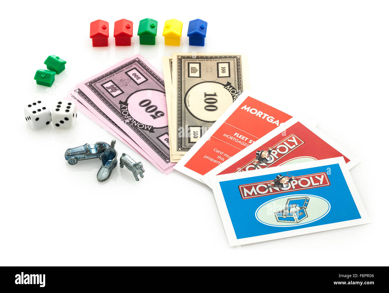 Monopoly Brettspiel mit Geld, Karten, Häuser, Hotels, Würfel und Marker Stockfoto