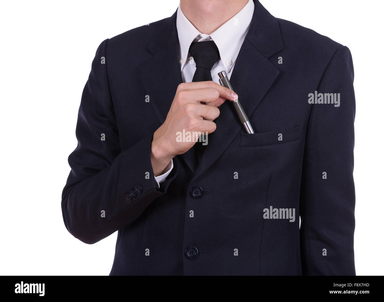 Geschäftsmann Kommissionierung einen Stift aus der Tasche isoliert auf weißem Hintergrund Stockfoto