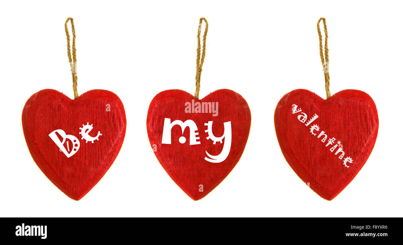 Werden Sie meine Valentine drei Holzherzen auf weißem Hintergrund Stockfoto