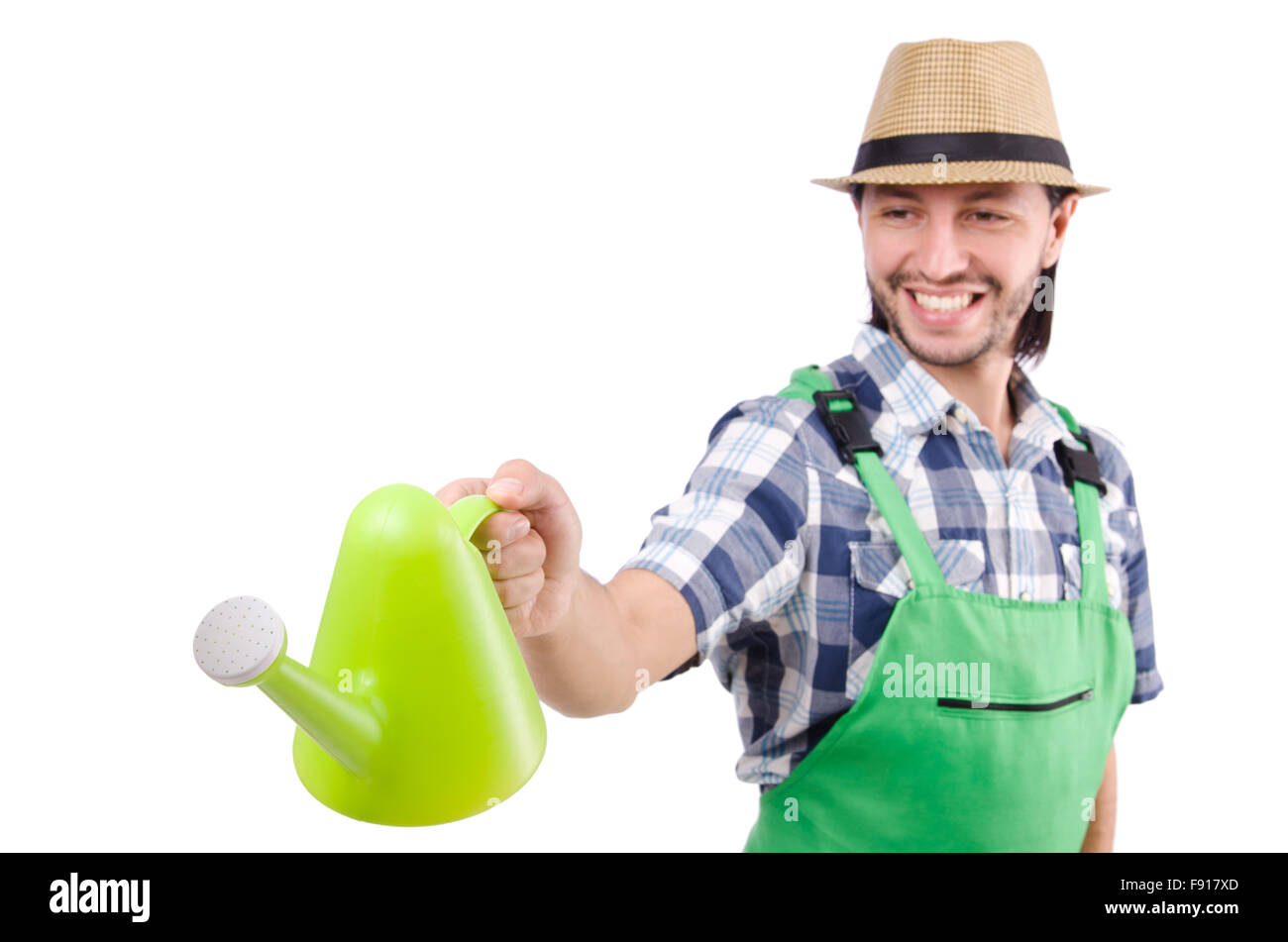 Junge fröhlich Gärtner mit Gießkanne isoliert auf weiss Stockfotografie