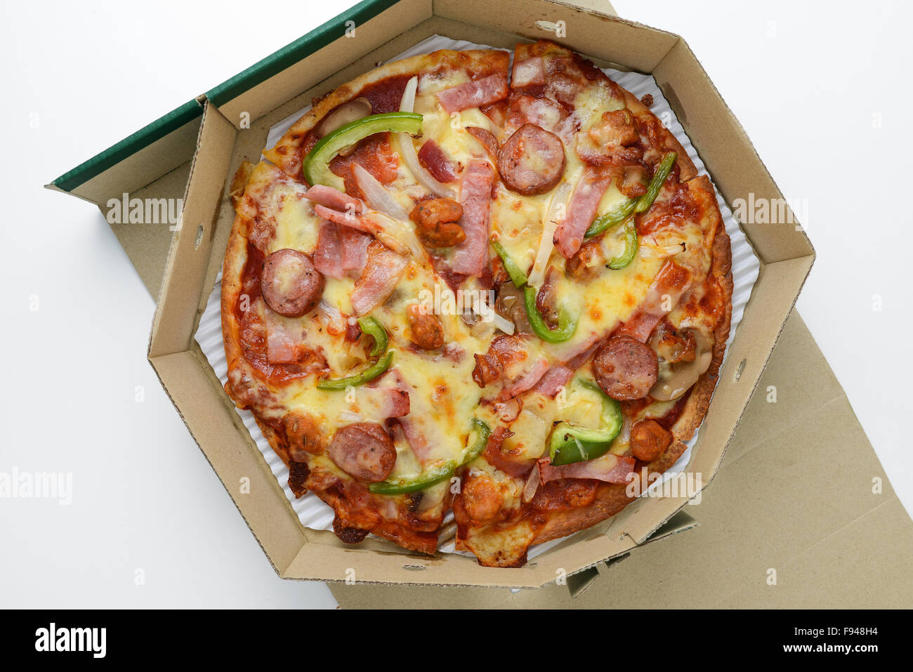 Pizza Schinken in box Stockfoto