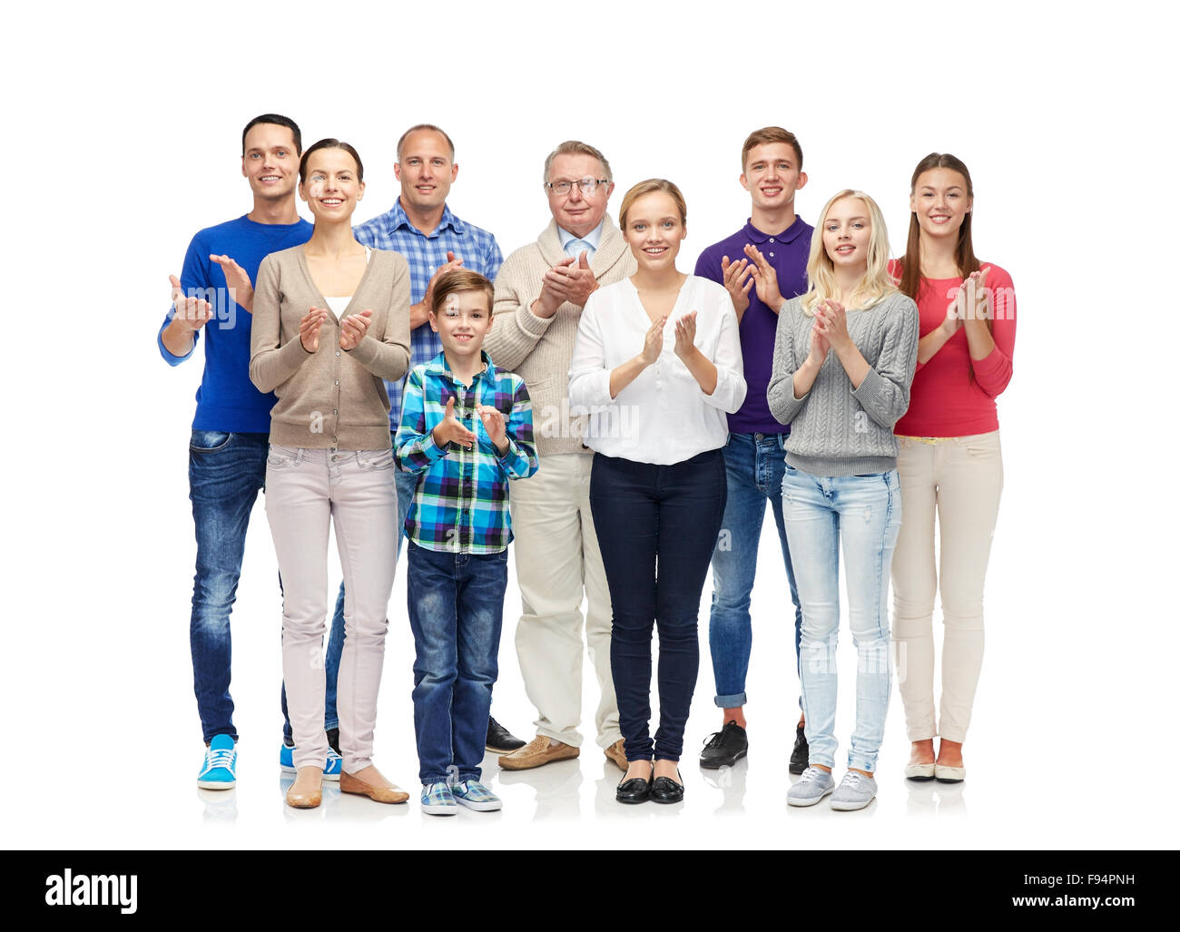 Gruppe von lächelnden Menschen applaudieren Stockfoto