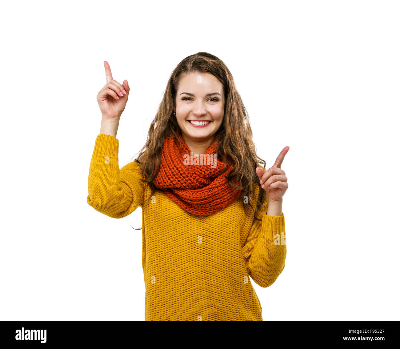 Porträt von schönen Mädchen im Herbst Kleidung nach oben zeigend, isoliert auf weißem Hintergrund Stockfoto