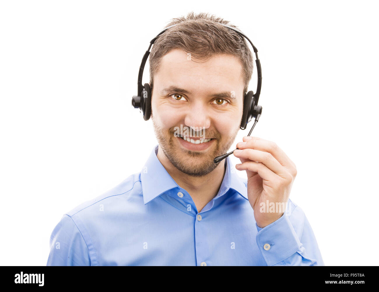 Call Center-Betreiber isoliert auf weiss. Schönen jungen Mann mit Kopfhörer. Stockfoto