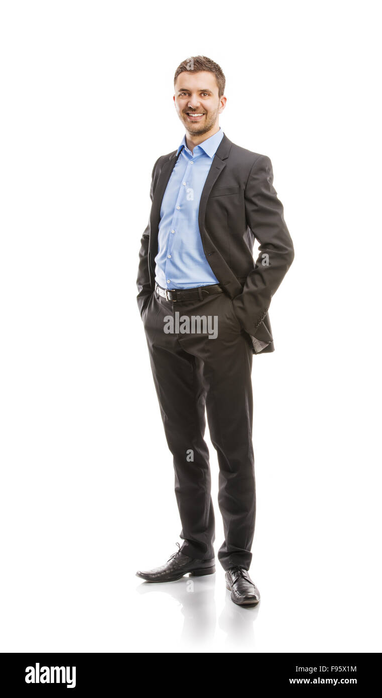 Erfolgreicher Geschäftsmann im Anzug posiert im Studio isoliert auf weißem Hintergrund. Ganzkörper-Porträts. Stockfoto