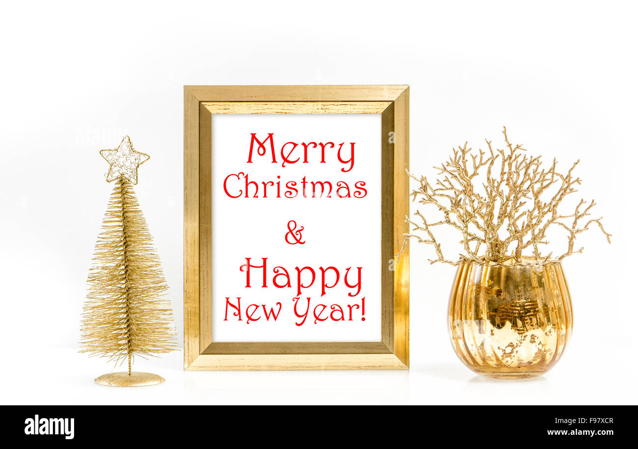 Goldrahmen und Weihnachtsdekoration. Grußkarte-Konzept mit Beispieltext Merry Christmas & Happy New Year! Stockfoto