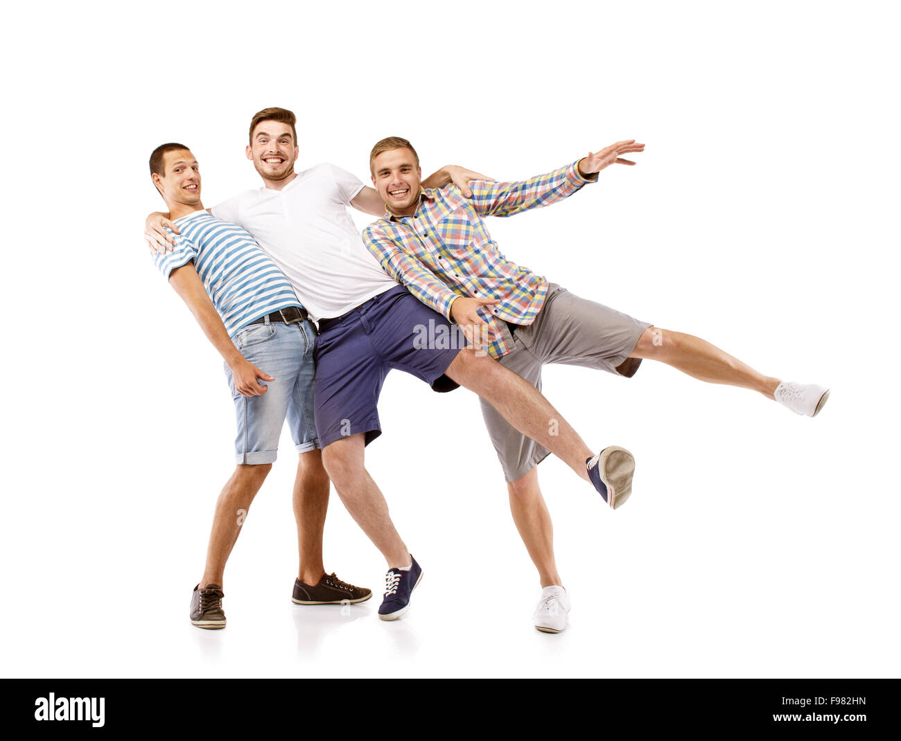 Gruppe junger Männer isoliert auf weißem Hintergrund. Beste Freunde Stockfoto