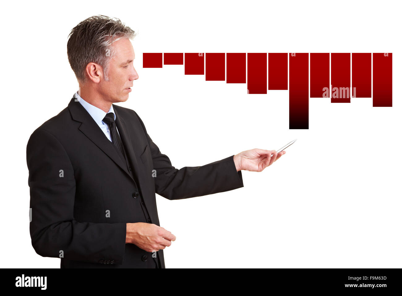 Senior Manager erklären, finanzielle Verluste mit einem Diagramm Stockfoto