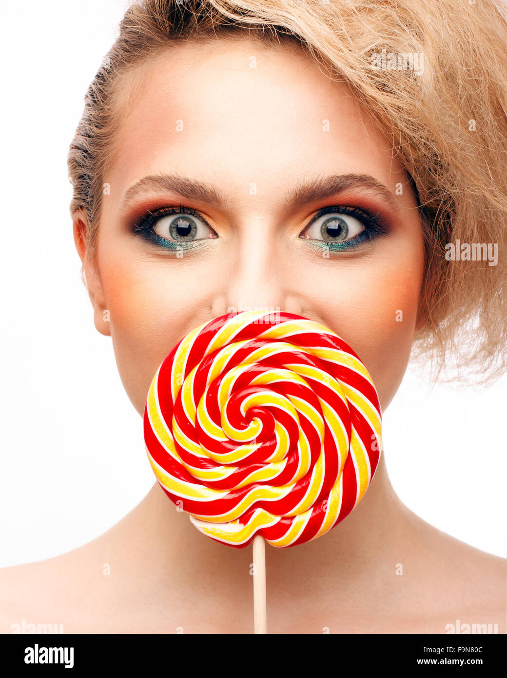 Porträt von schönen Mädchen mit großen lollipop Stockfoto