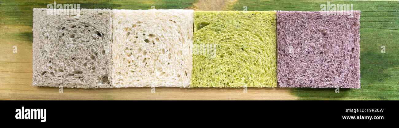 verschiedene Brot - purpurroten Mais, Spinat, schwarzem Sesam und weißen toast Stockfoto