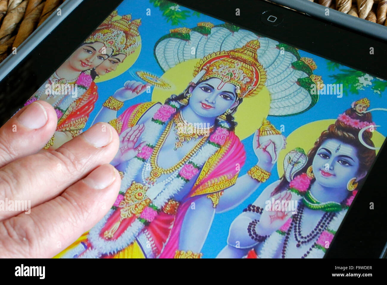 Hindu-Gottheiten auf einem Ipad. Stockfoto