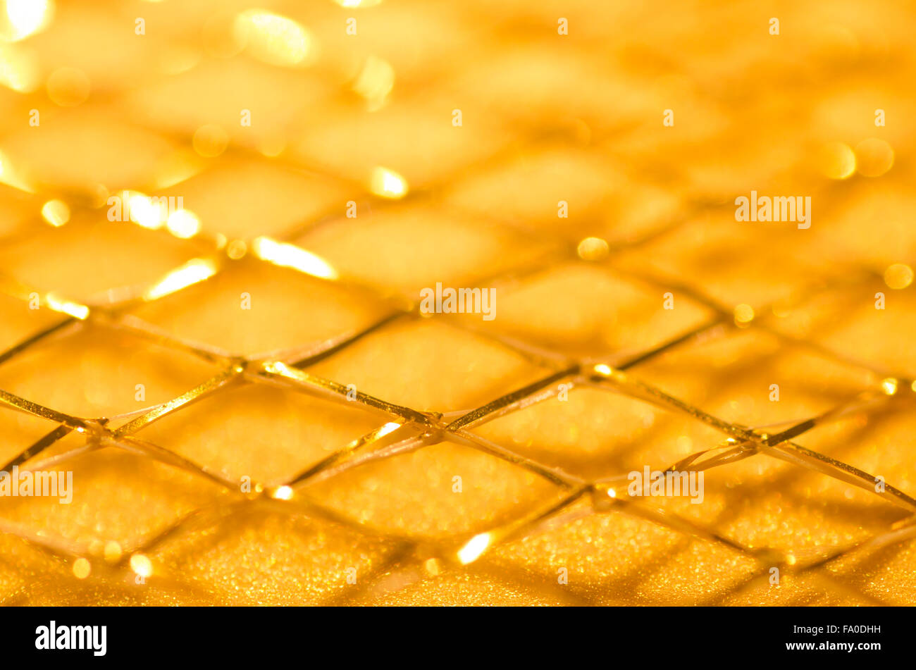 Goldene Rasterhintergrund selektiven Fokus Textur Stockfoto