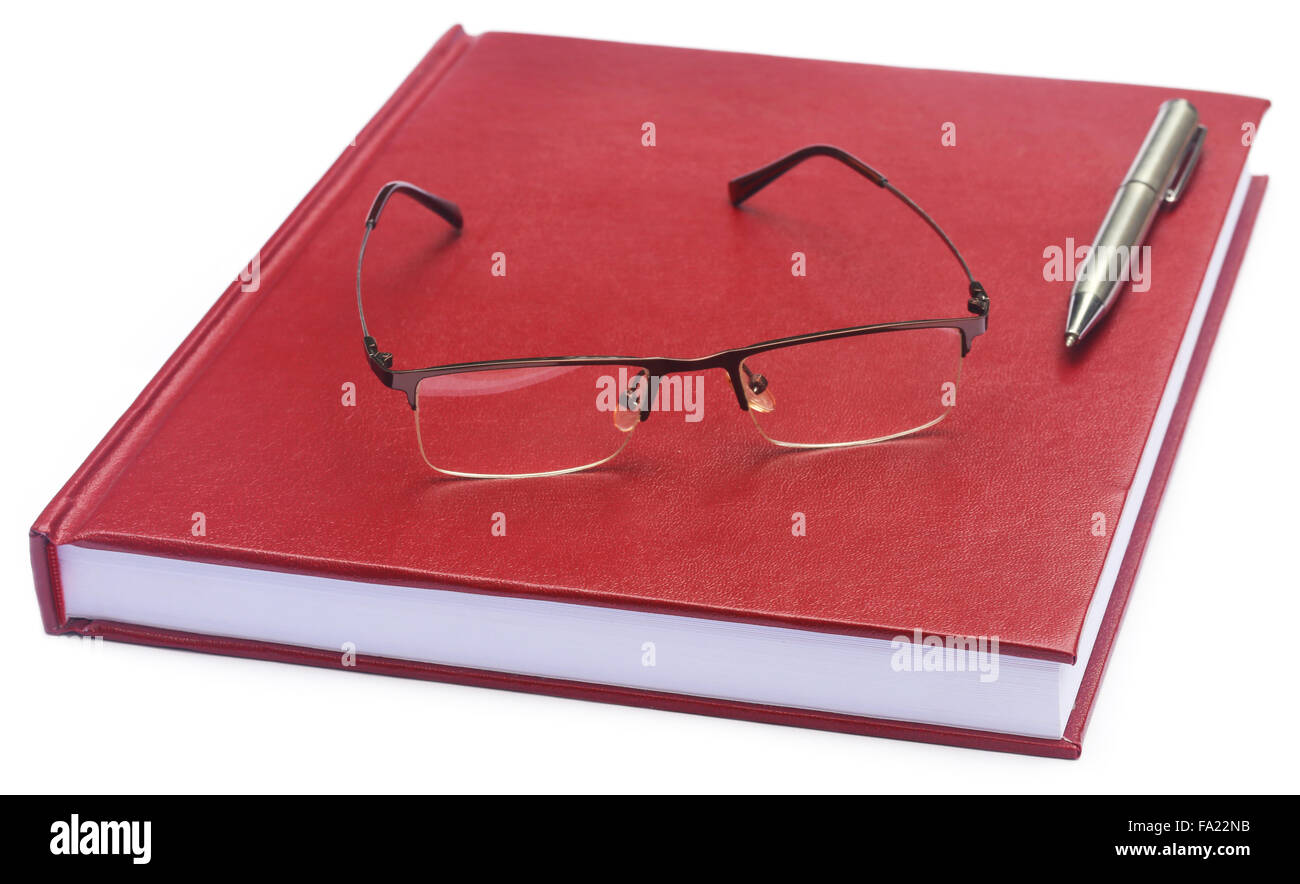 Kastanienbraun gefärbt Thesenpapier mit Brille und Stift Stockfoto
