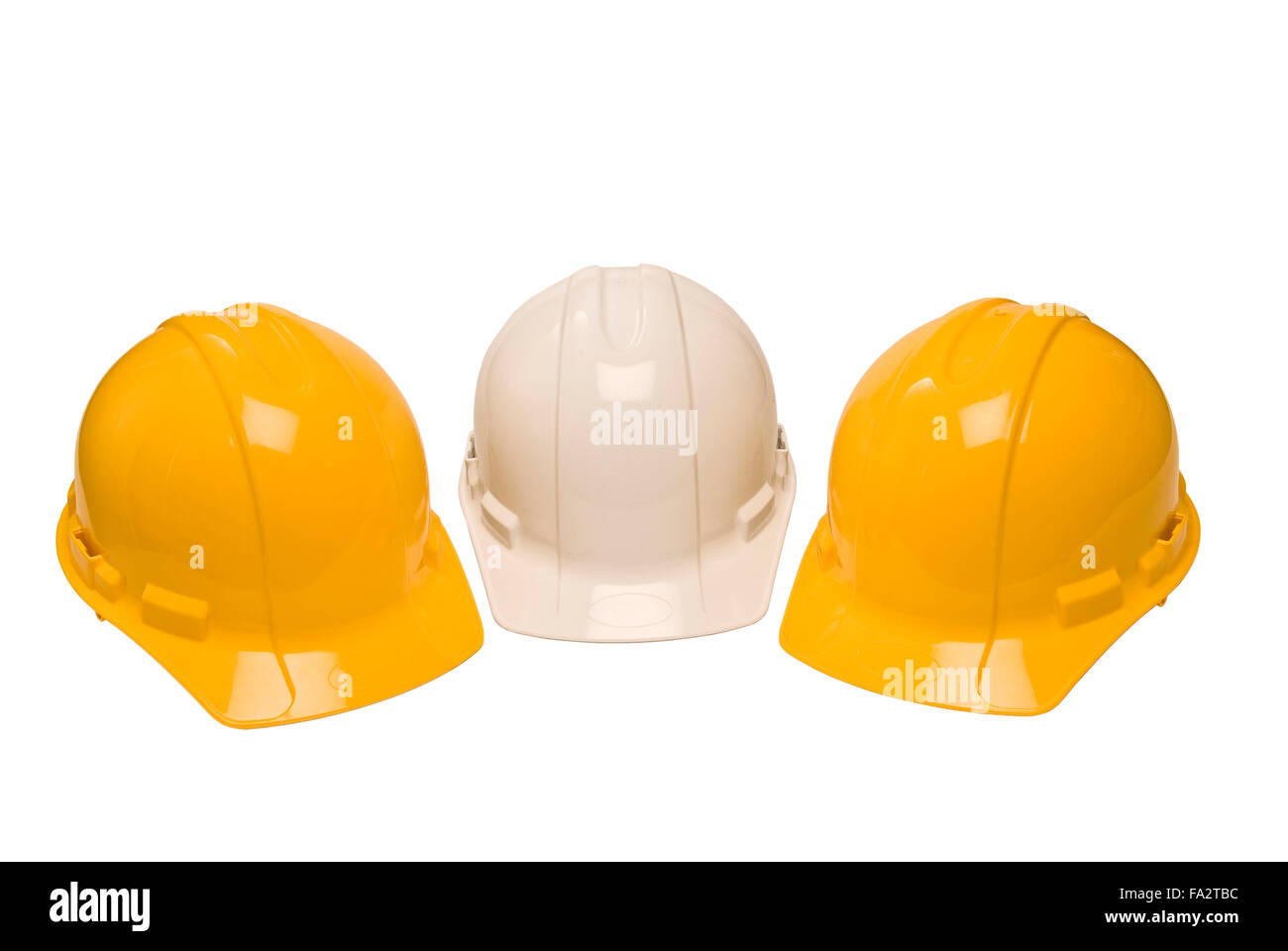 Drei Bau-Helme, Isolated on White Stockfoto
