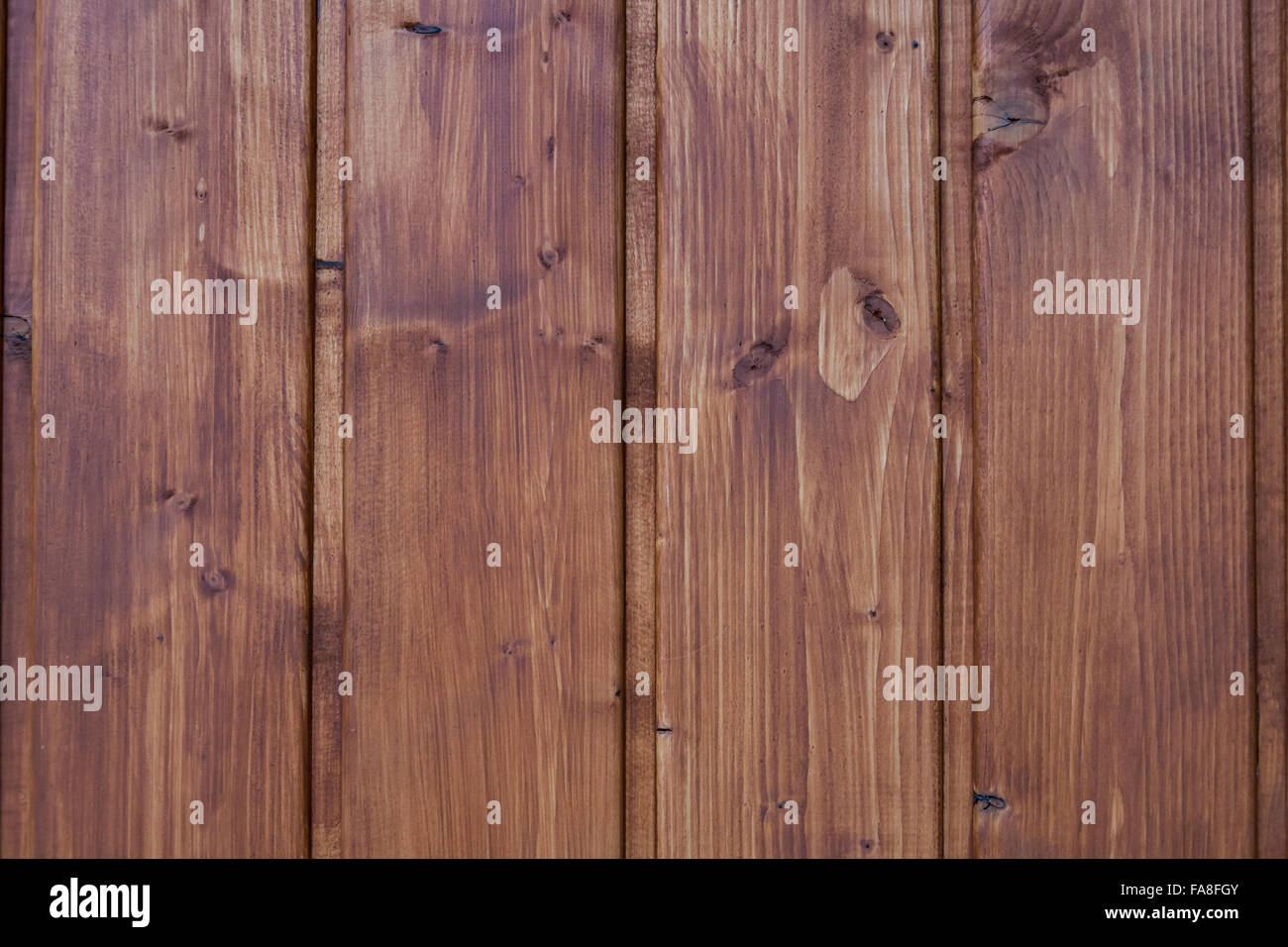 Textur, Hintergrund, Muster oder Tapete der dunkle vertikale Holzplanken Stockfoto