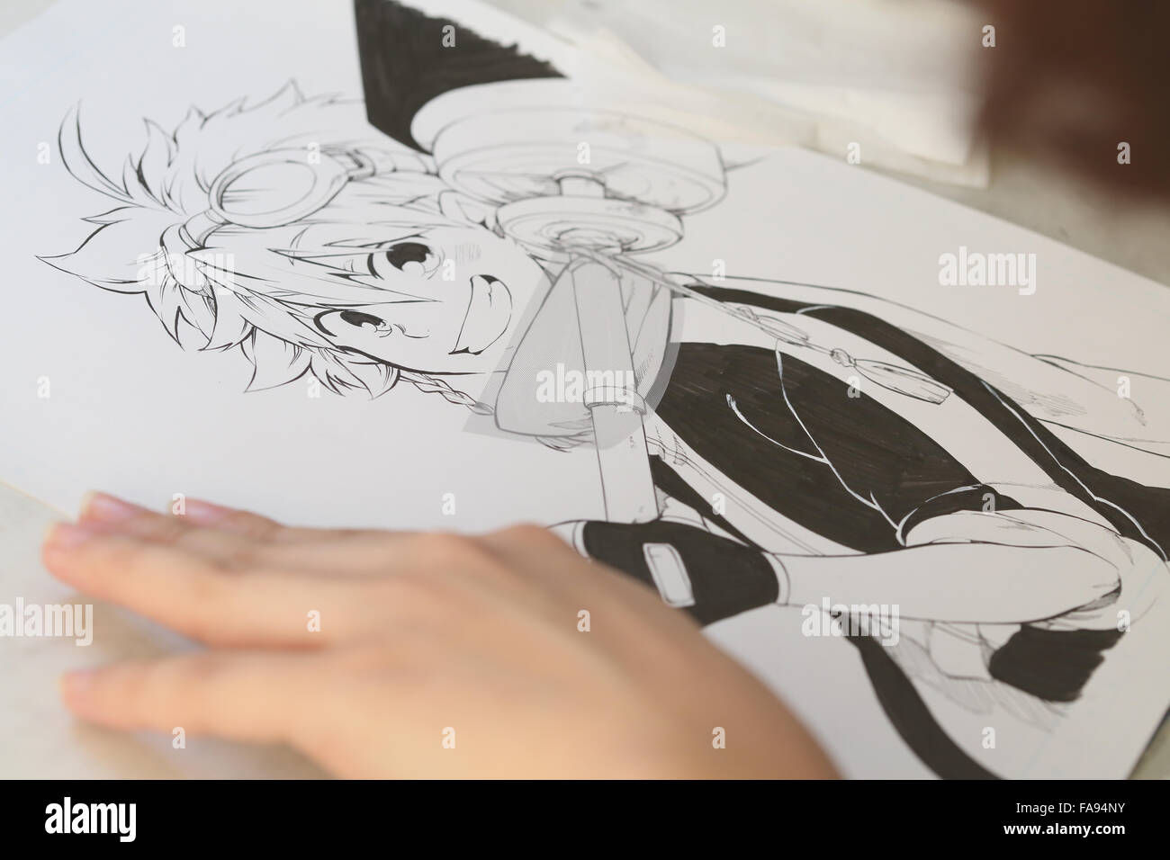 Japanische Manga-Zeichner arbeiten im studio Stockfoto