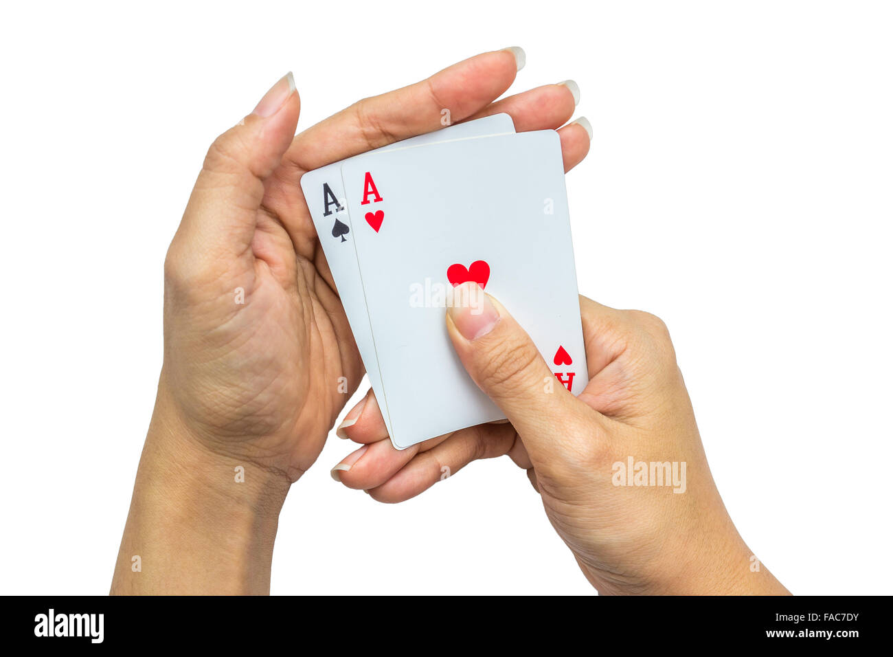 Spielkarten in der Hand isoliert auf weißem Hintergrund Stockfoto
