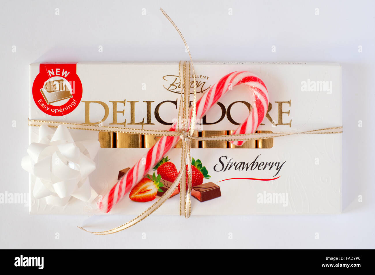 Erdbeer Milch-Schokolade mit Zuckerstange Stockfoto