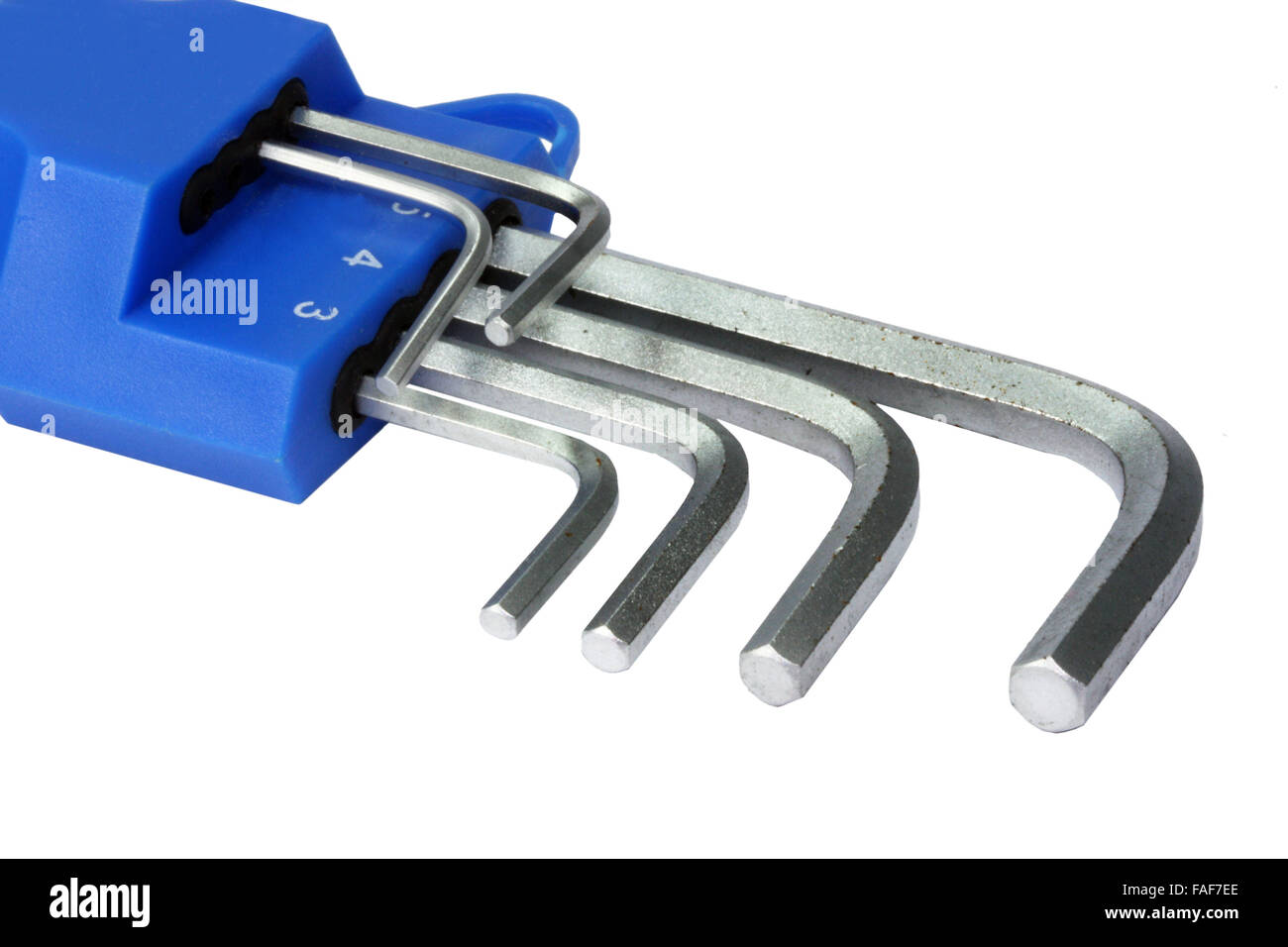 eine Reihe von Schlüsseln auf weißem Hintergrund Stockfoto