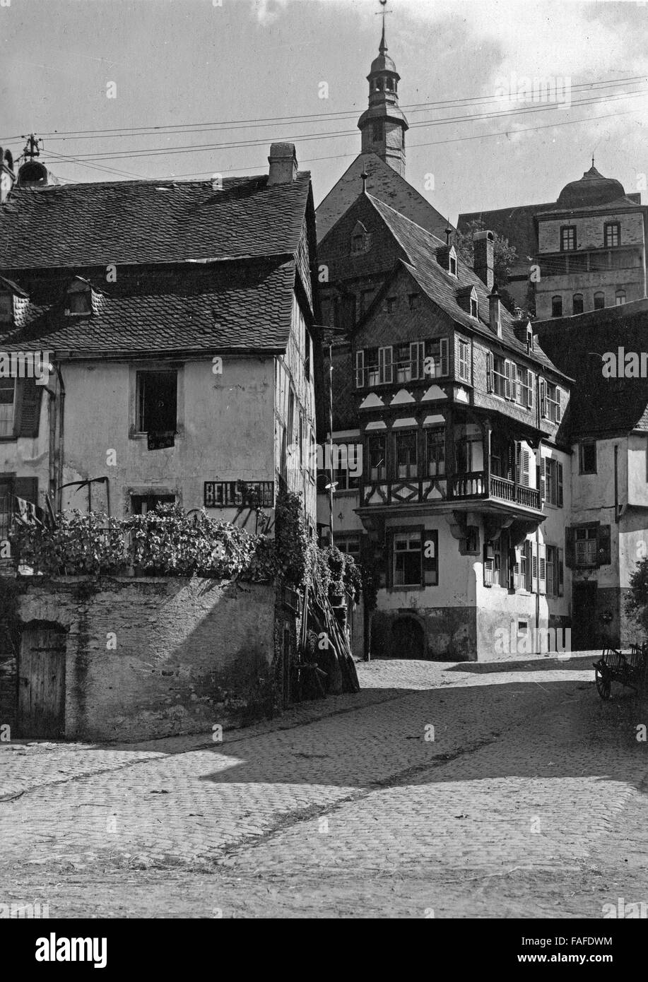 Gassen in Beilstein an der Mosel, Deutschland, 1930er Jahre. Fachwerkhäuser in Beilstein am Fluss Mosel, Deutschland der 1930er Jahre. Stockfoto