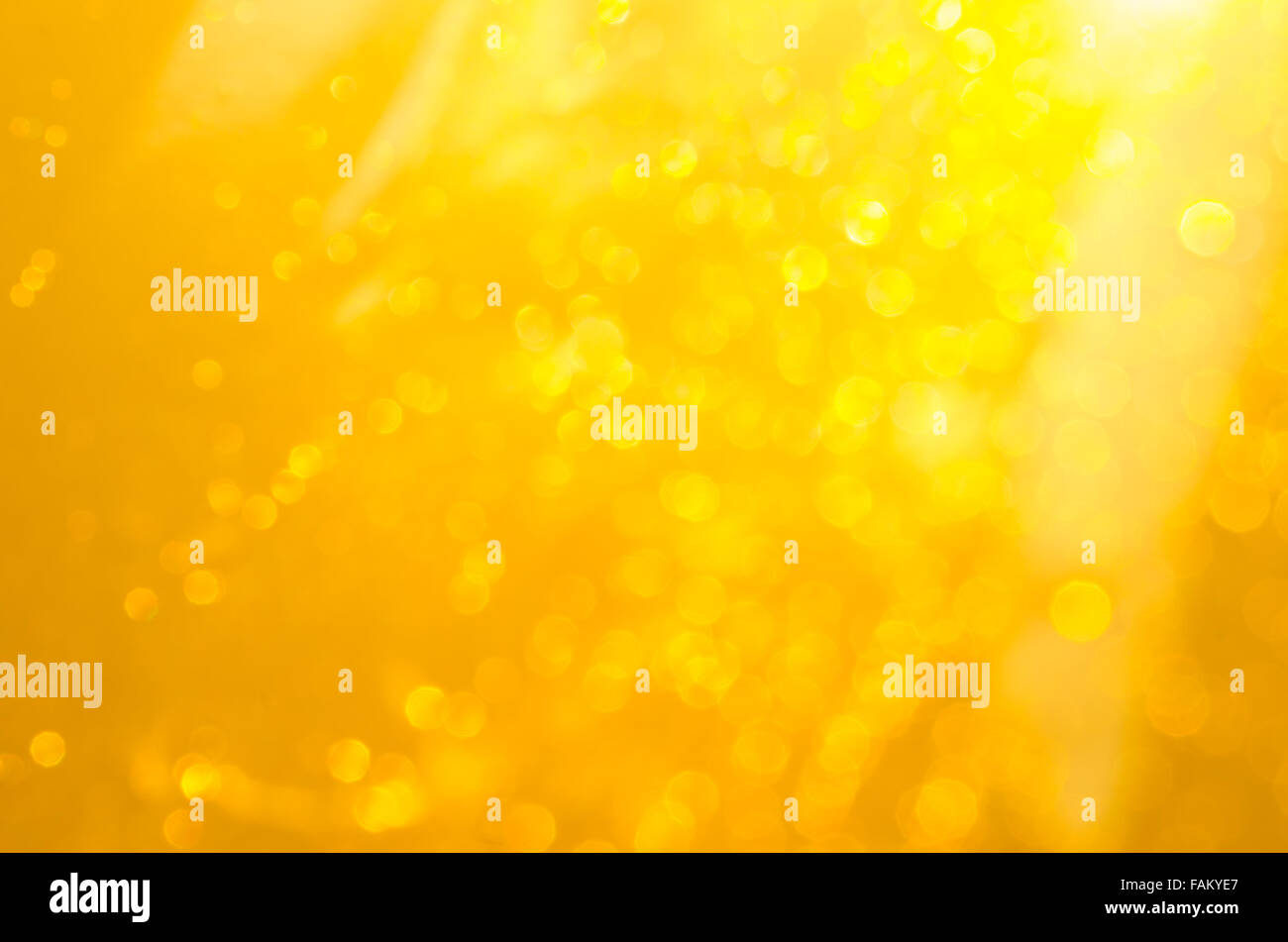 goldener Farbe leuchtet defokussierten Hintergrund Stockfoto
