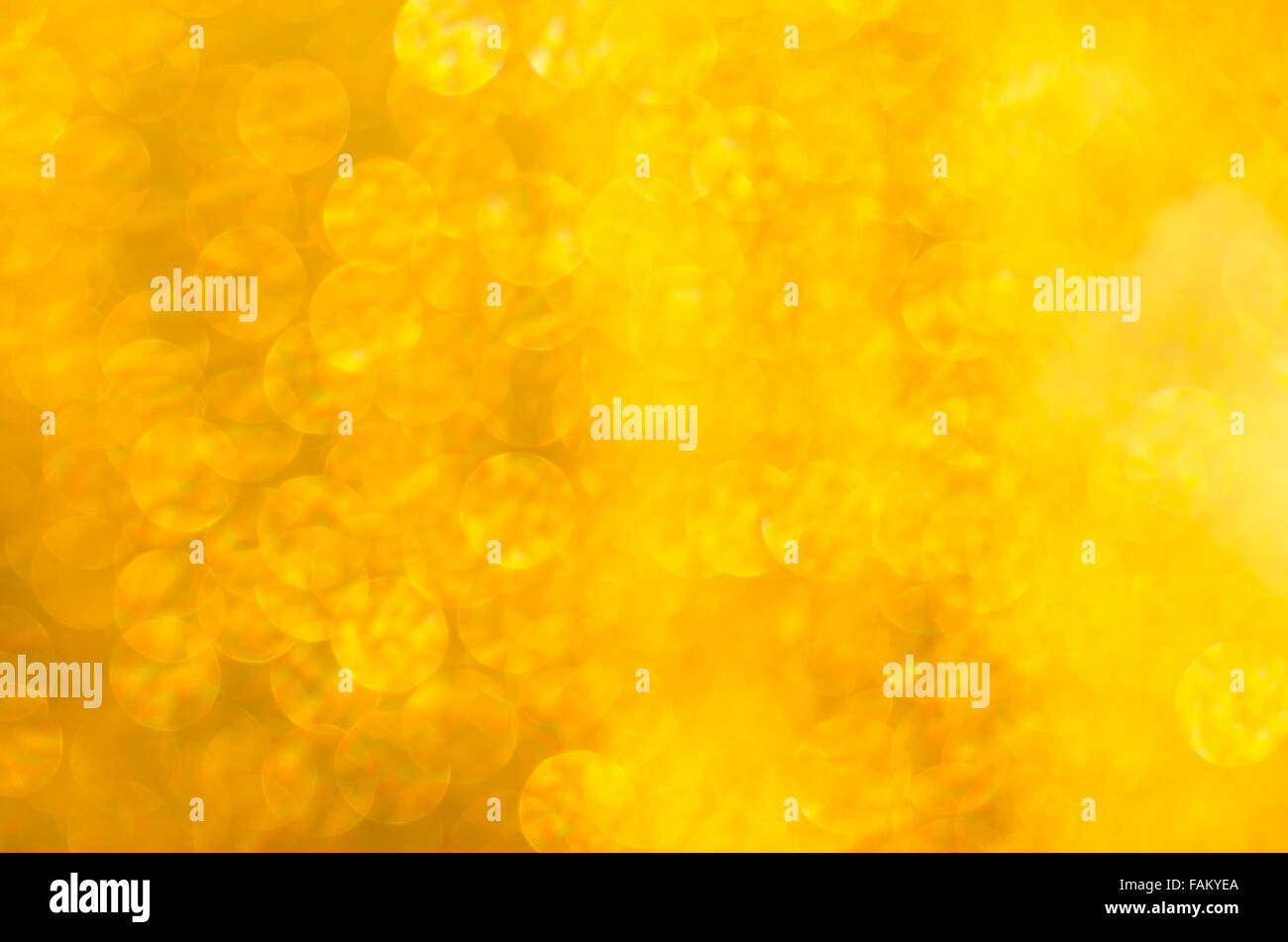 goldener Farbe leuchtet defokussierten Hintergrund Stockfoto