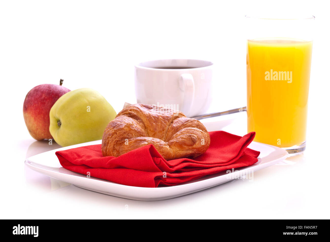 Frühstück mit Orangensaft und frische Früchte auf Tisch Stockfoto