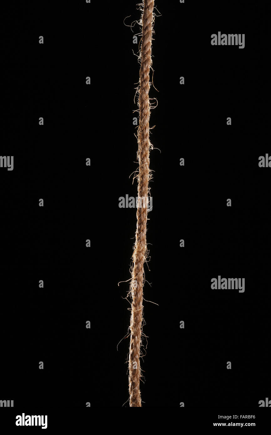 Stroh Seil auf die schwarze Farbe Hintergrund Stockfoto