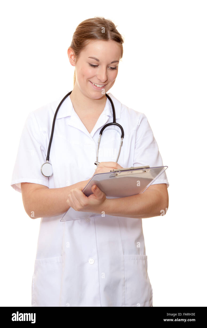 Attraktive Krankenschwester Holding klinischen Datensatz. Alle auf weißem Hintergrund... Alle auf weißem Hintergrund. Stockfoto