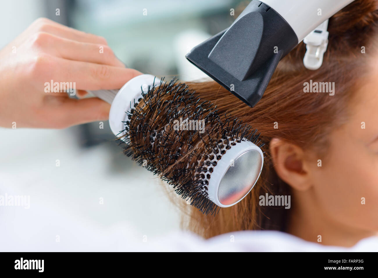 Prozess der Gestaltung der Frisur. Stockfoto