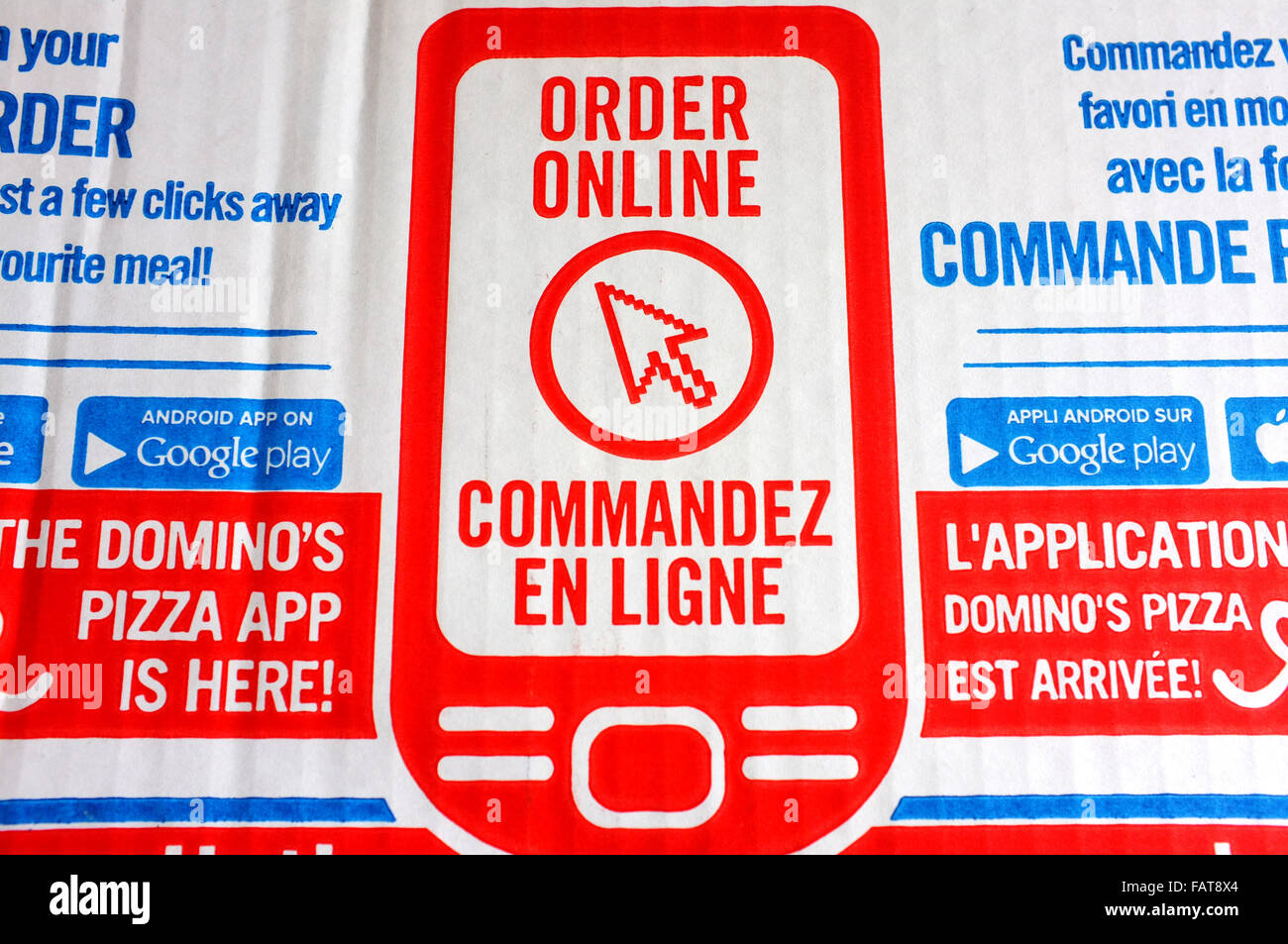 Dominos Pizzakarton mit einer Bestellung Online-Anzeige auf. Stockfoto