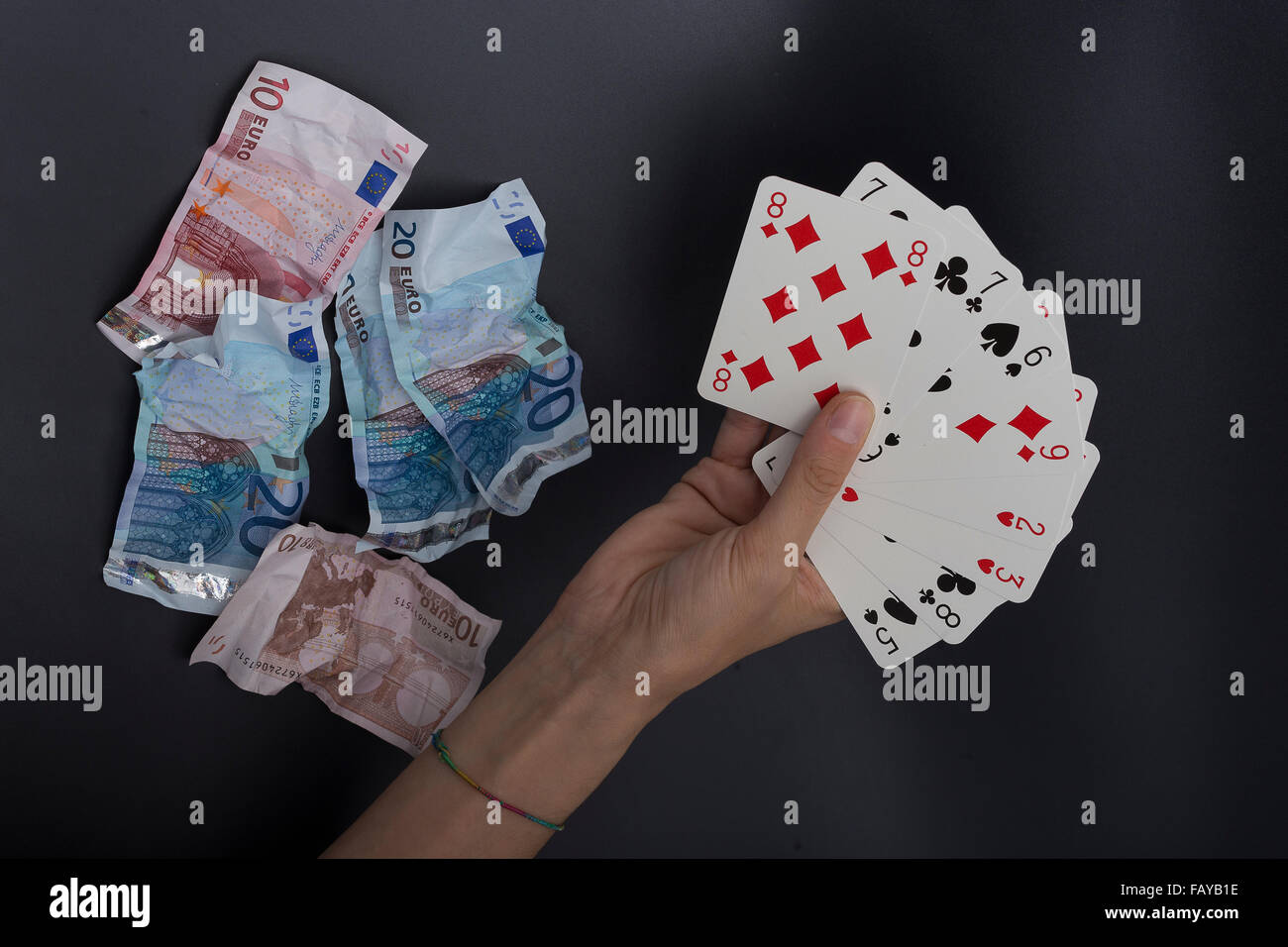 Kartenspieler, Abfall Geld Stockfoto