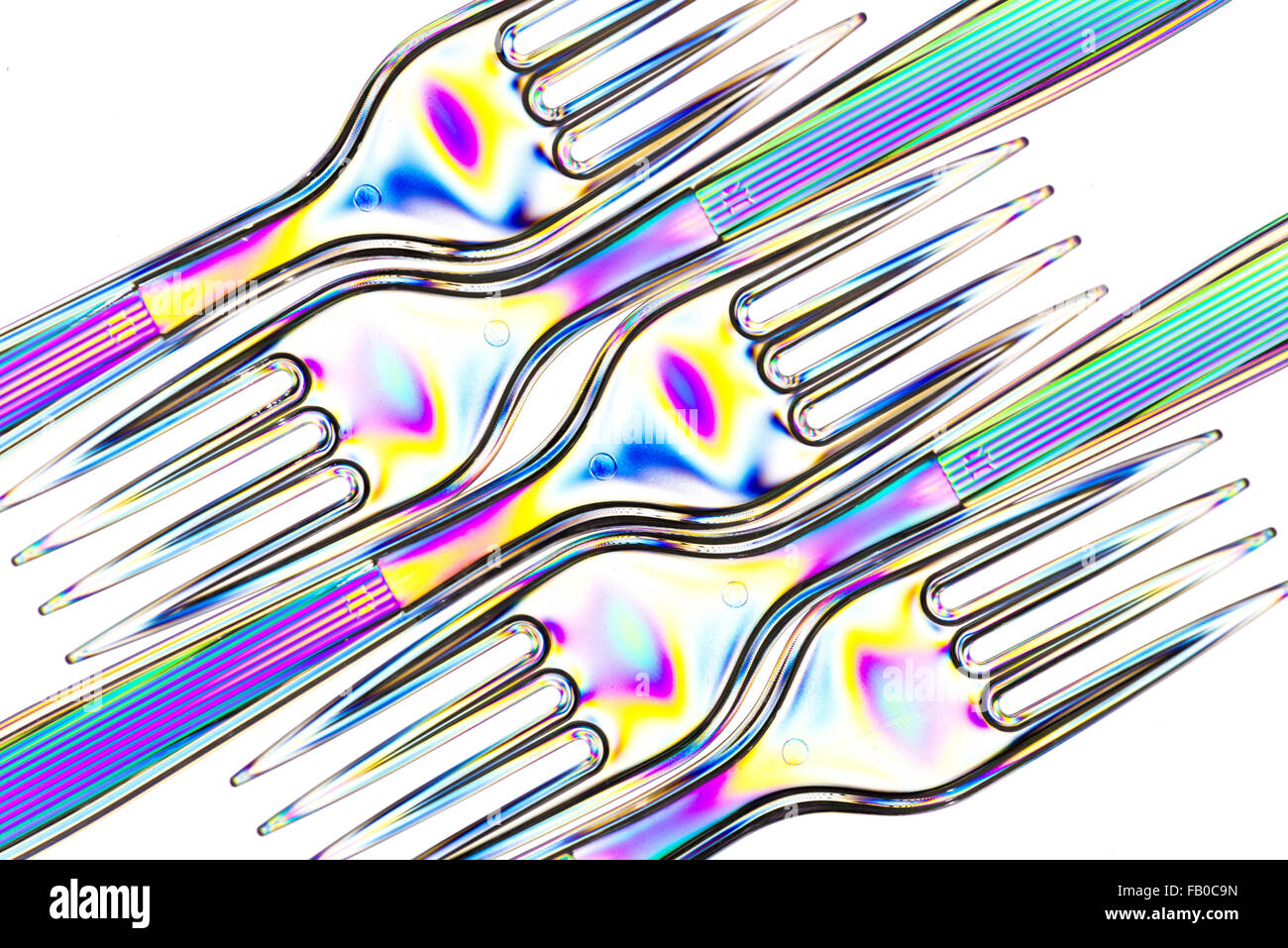 Kunststoff-Gabeln mit polarisiertem Licht gesehen Stockfoto