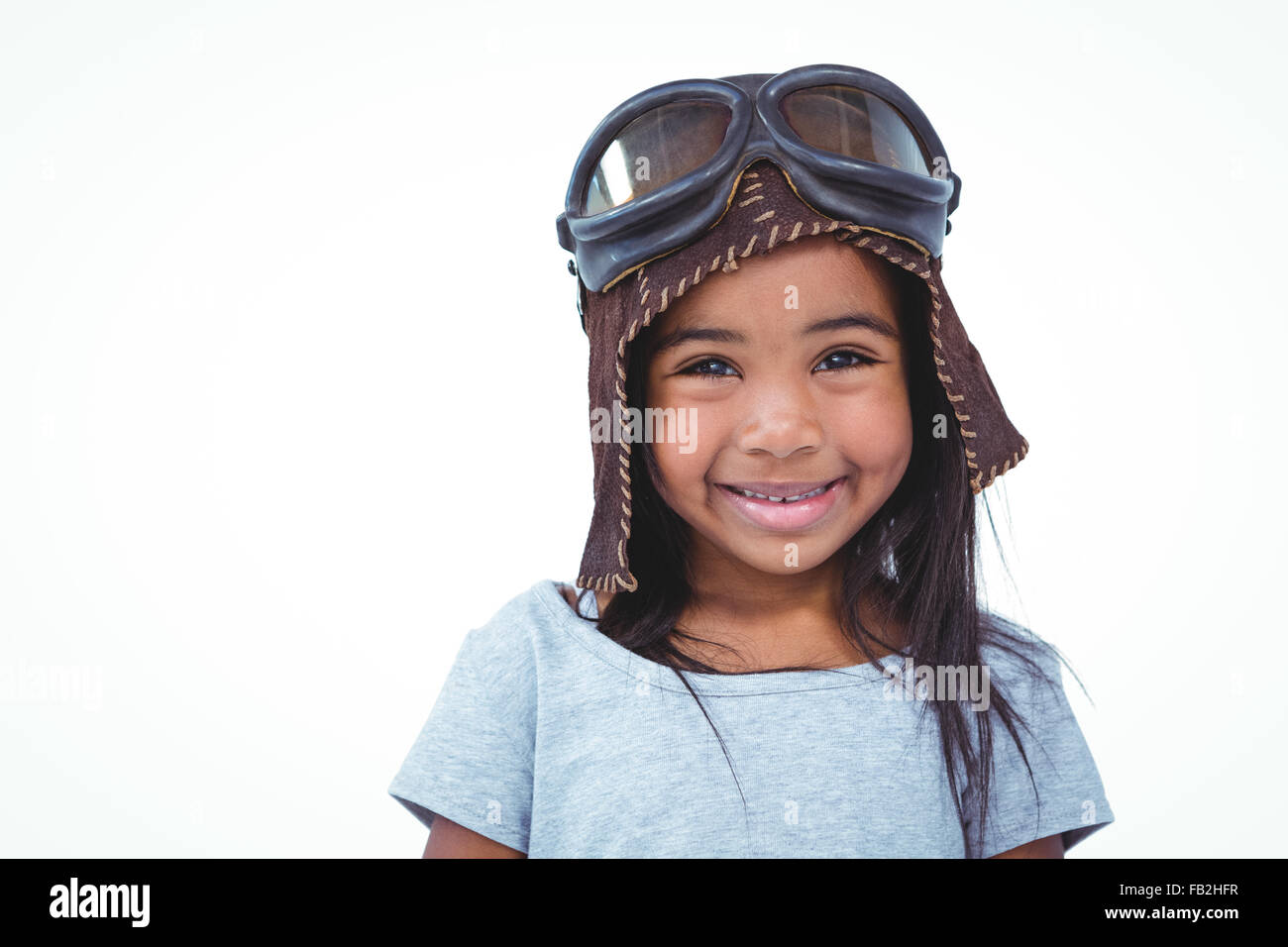 Lächelndes Mädchen vorgibt, pilot Stockfoto