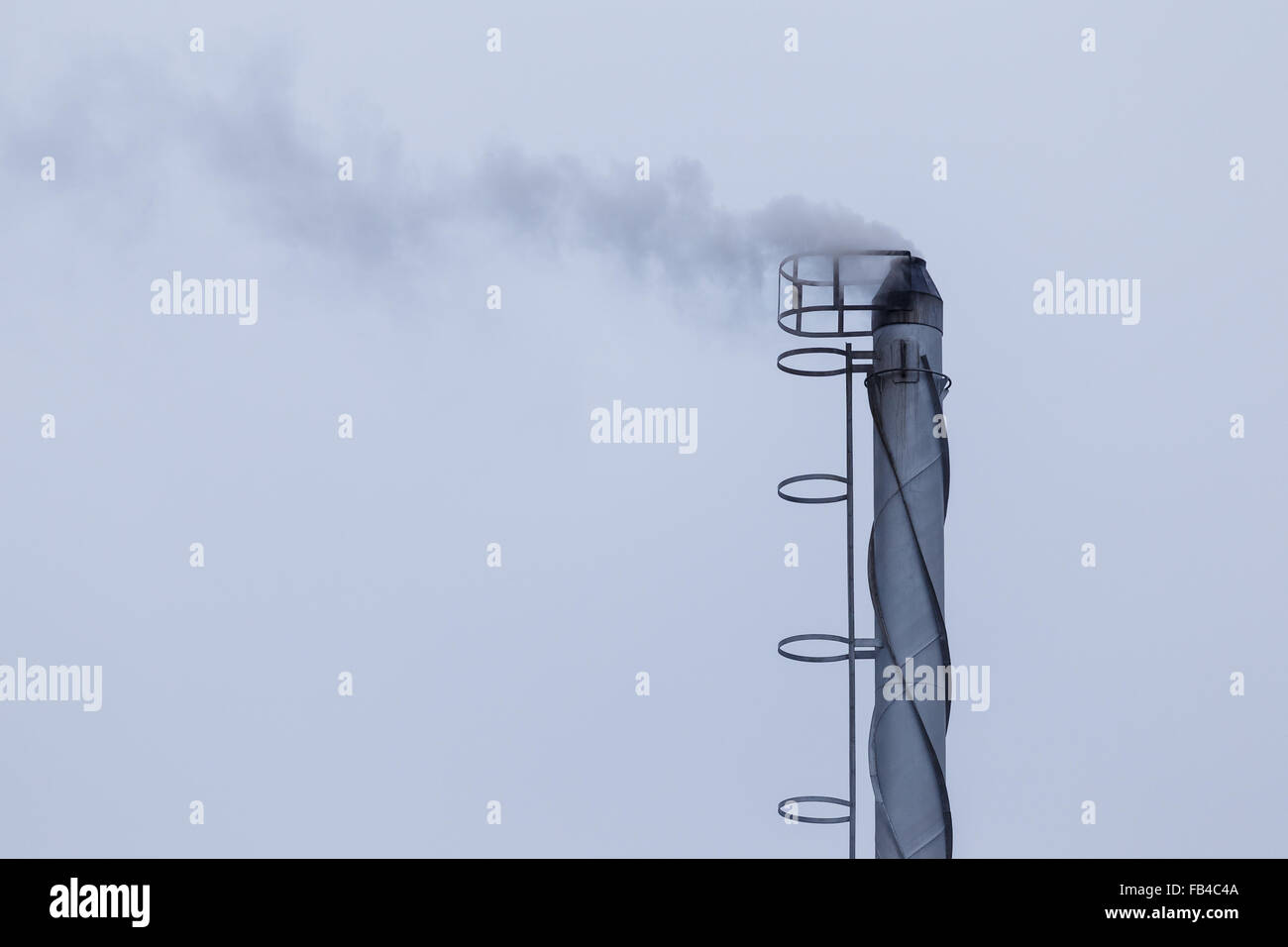 Industrielle Rauchen Schornstein Stockfoto