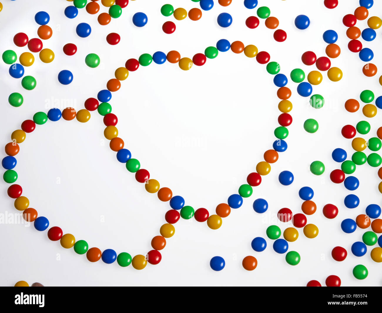 Multi Farbe beschichtete Schokolade in Herzform Stockfoto