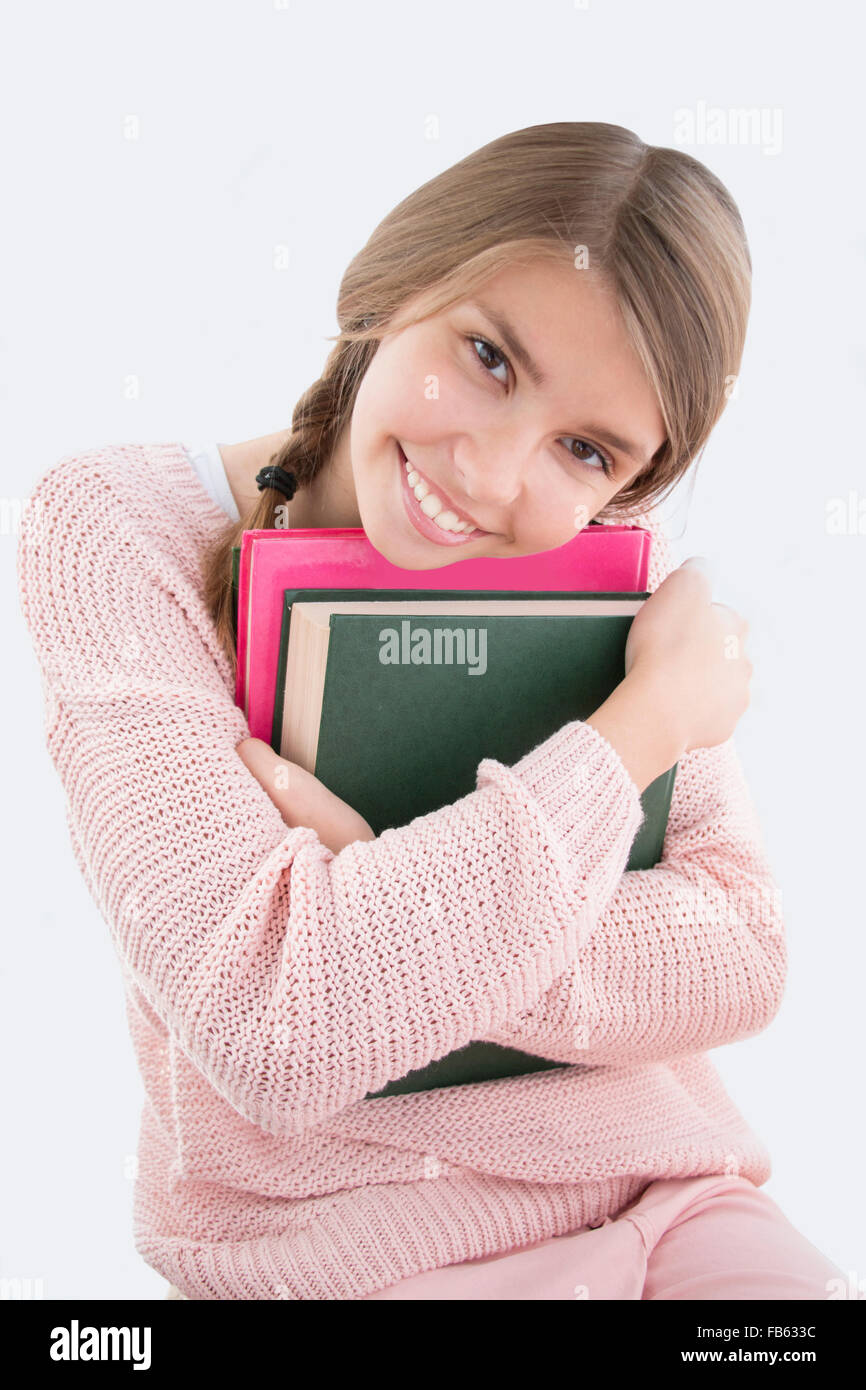 Teenager-Mädchen mit Buch Stockfoto