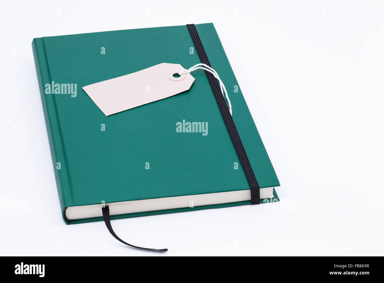 Bild zeigt einen grünen Notebook isoliert auf weißem Hintergrund Stockfoto