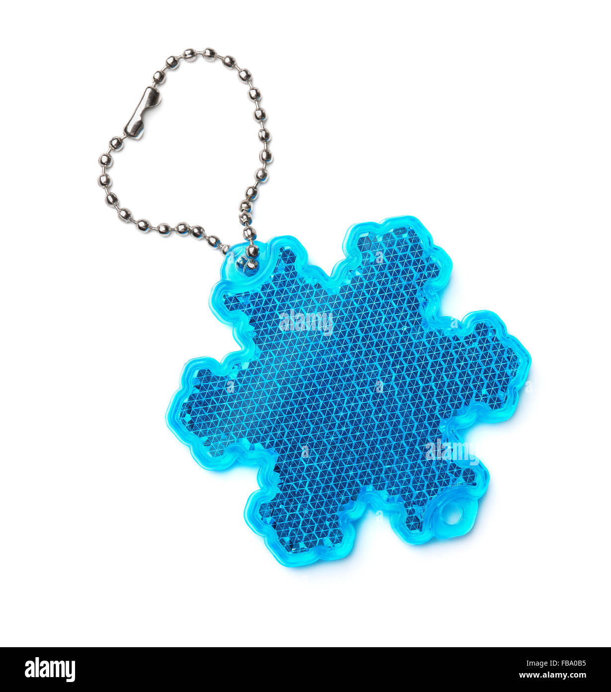 Schneeflocke Sicherheit Reflektor Keyring isoliert auf weiss Stockfoto